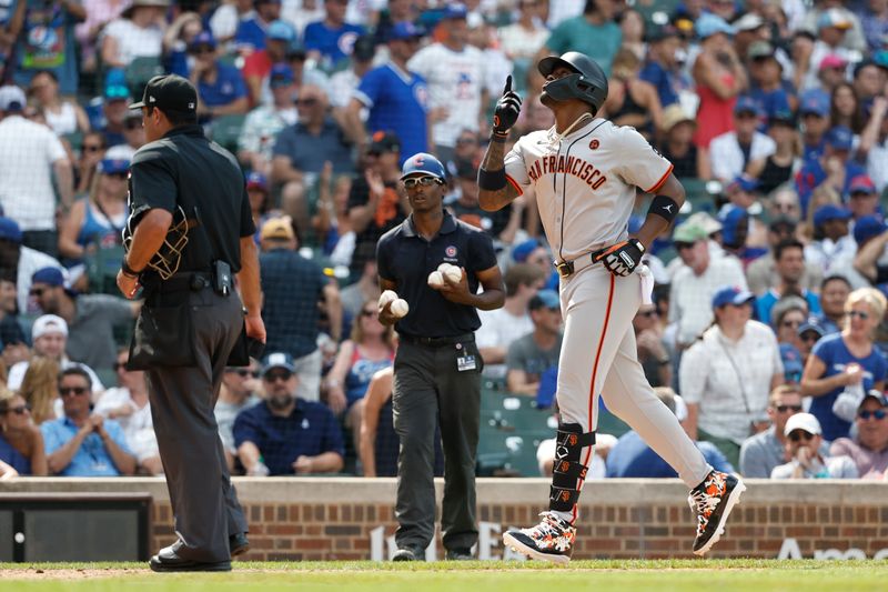 Jun 19, 2024; Chicago, Illinois, USA; San Francisco Giants designated hitter Jorge Soler (2) rounds the bases after hitting a grand slam against the Chicago Cubs during the eight inning at Wrigley Field. Mandatory Credit: Kamil Krzaczynski-USA TODAY Sports