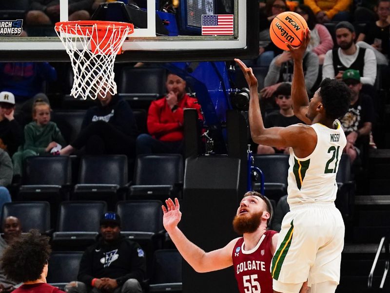 Mar 22, 2024; Memphis, TN, USA; during the first half shoots over Colgate Raiders forward Jeff Woodward (55) during the first half of the NCAA Tournament First Round at FedExForum. Mandatory Credit: John David Mercer-USA TODAY Sports