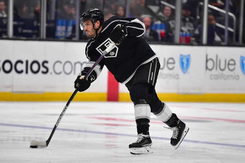 Mar 16, 2023; Los Angeles, California, USA; Los Angeles Kings defenseman Matt Roy (3) shoots on goal against the Columbus Blue Jackets during the second period at Crypto.com Arena. Mandatory Credit: Gary A. Vasquez-USA TODAY Sports