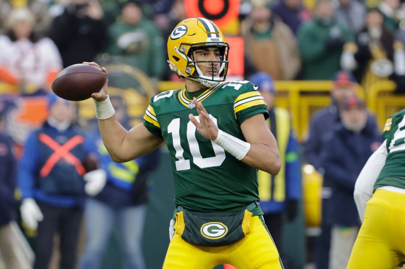 Green Bay Packers quarterback Jordan Love throws during the first half of an NFL football game against the Chicago Bears Sunday, Jan. 7, 2024, in Green Bay, Wis. (AP Photo/Mike Roemer)