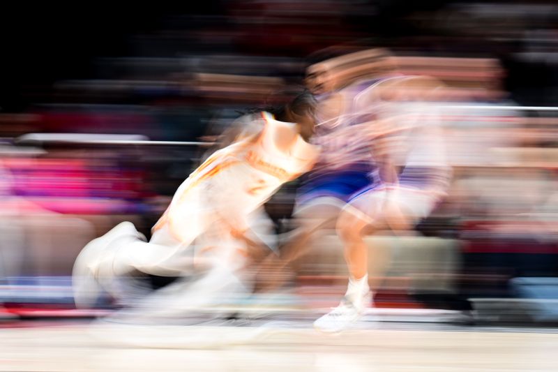 ATLANTA, GA - MARCH 10:(EDITOR'S NOTE: Image was captured using a slow shutter speed) Keaton Wallace #2 of the Atlanta Hawks handles the ball during the game against the Philadelphia 76ers on March 10, 2025 at State Farm Arena in Atlanta, Georgia.  NOTE TO USER: User expressly acknowledges and agrees that, by downloading and/or using this Photograph, user is consenting to the terms and conditions of the Getty Images License Agreement. Mandatory Copyright Notice: Copyright 2025 NBAE(Photo by Adam Hagy/NBAE via Getty Images)