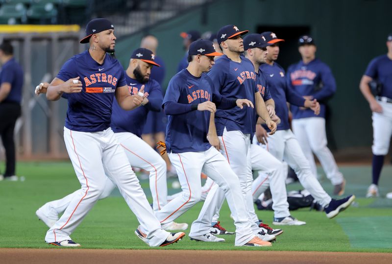 Oct 15, 2023; Houston, Texas, USA; Houston Astros warm up before game one of the ALCS for the 2023 MLB playoffs at Minute Maid Park. Mandatory Credit: Erik Williams-USA TODAY Sports