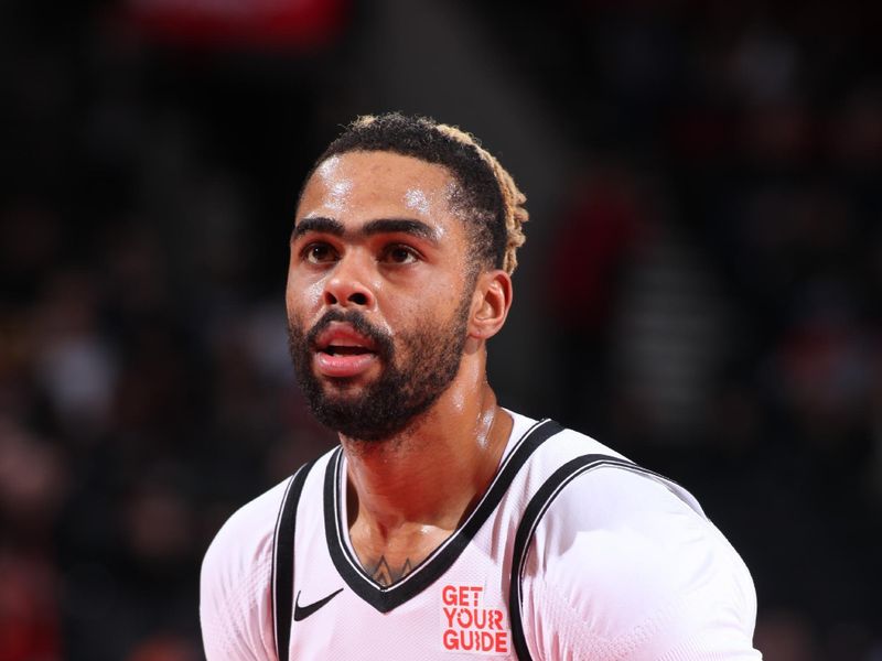 PORTLAND, OR - JANUARY 14: D'Angelo Russell #1 of the Brooklyn Nets prepares to shoot a free throw during the game against the Portland Trail Blazers on January 14, 2025 at the Moda Center Arena in Portland, Oregon. NOTE TO USER: User expressly acknowledges and agrees that, by downloading and or using this photograph, user is consenting to the terms and conditions of the Getty Images License Agreement. Mandatory Copyright Notice: Copyright 2025 NBAE (Photo by Cameron Browne/NBAE via Getty Images)