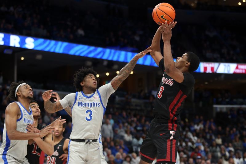 Feb 12, 2023; Memphis, Tennessee, USA; Temple Owls guard Hysier Miller (3) shoots as Memphis Tigers guard Kendric Davis (3) defends during the second half at FedExForum. Mandatory Credit: Petre Thomas-USA TODAY Sports