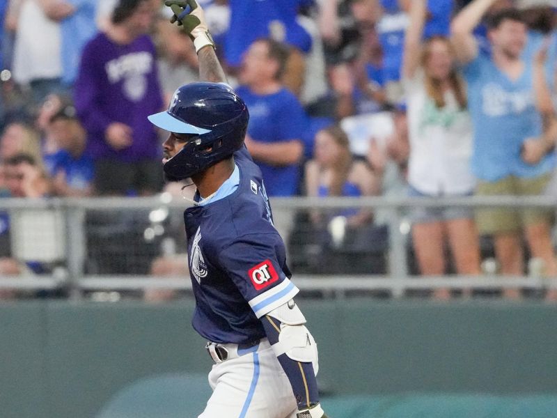 May 17, 2024; Kansas City, Missouri, USA; Kansas City Royals third baseman Maikel Garcia (11) celebrates while running the bases after hitting a three-run home run against the Oakland Athletics in the sixth inning at Kauffman Stadium. Mandatory Credit: Denny Medley-USA TODAY Sports