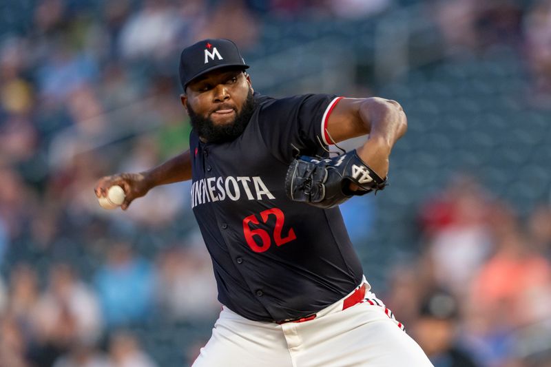 Jun 10, 2024; Minneapolis, Minnesota, USA; Minnesota Twins pitcher Diego Castillo (62) delivers a pitch against the Colorado Rockies in the ninth inning at Target Field. Mandatory Credit: Jesse Johnson-USA TODAY Sports