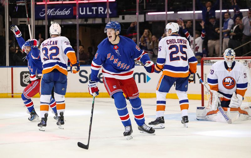 Sep 24, 2024; New York, New York, USA; New York Rangers center Adam Edstrom (84) celebrates his game-winning goal against the New York Islanders during the third period at Madison Square Garden. Mandatory Credit: Danny Wild-Imagn Images