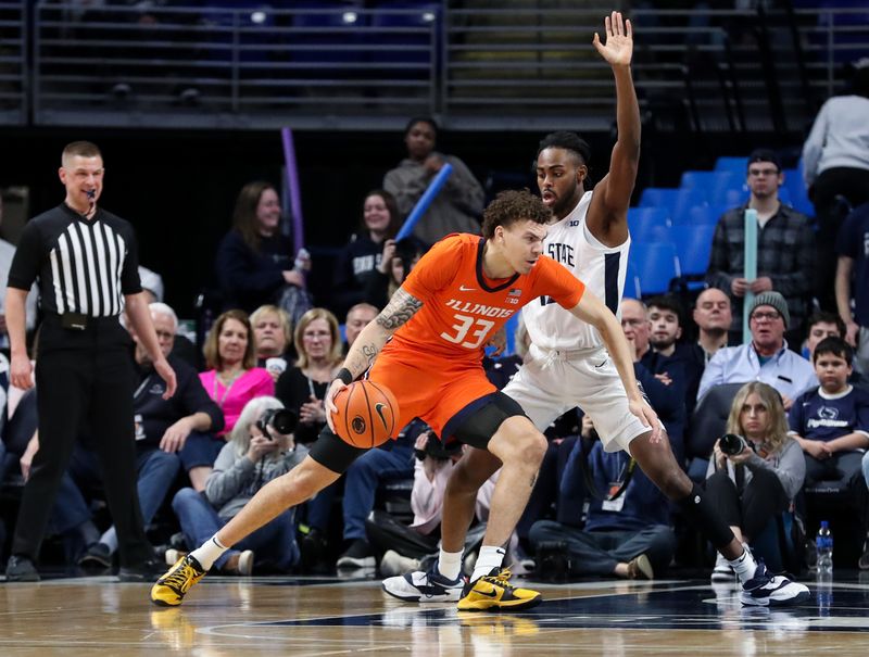 Feb 14, 2023; University Park, Pennsylvania, USA; Illinois Fighting Illini forward Coleman Hawkins (33) dribbles the ball towards the basket as Penn State Nittany Lions guard/forward Evan Mahaffey (12) defends during the first half at Bryce Jordan Center. Mandatory Credit: Matthew OHaren-USA TODAY Sports