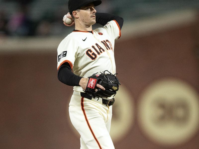 Aug 14, 2024; San Francisco, California, USA; San Francisco Giants right fielder Mike Yastrzemski (5) pitches the ninth inning against the Atlanta Braves at Oracle Park. Mandatory Credit: D. Ross Cameron-USA TODAY Sports