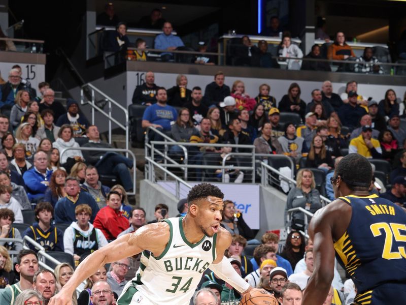 INDIANAPOLIS, IN - JANUARY 3: Giannis Antetokounmpo #34 of the Milwaukee Bucks dribbles the ball during the game against the Indiana Pacers on January 3, 2024 at Gainbridge Fieldhouse in Indianapolis, Indiana. NOTE TO USER: User expressly acknowledges and agrees that, by downloading and or using this Photograph, user is consenting to the terms and conditions of the Getty Images License Agreement. Mandatory Copyright Notice: Copyright 2024 NBAE (Photo by Jeff Haynes/NBAE via Getty Images)