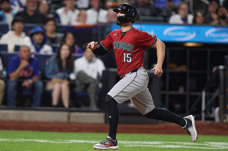 Apr 29, 2025; New York City, New York, USA; Arizona Diamondbacks designated hitter Randal Grichuk (15) scores a run during the eighth inning against the New York Mets at Citi Field. Mandatory Credit: Vincent Carchietta-Imagn Images