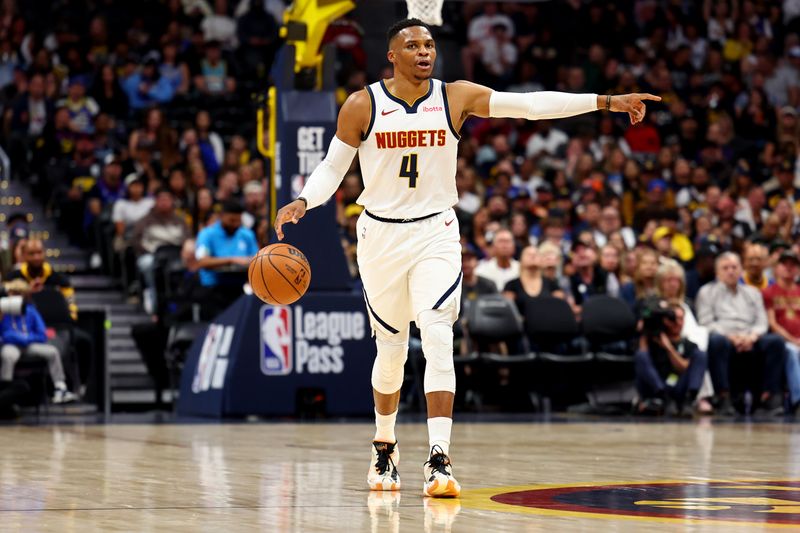 DENVER, COLORADO - OCTOBER 13: Russell Westbrook #4 of the Denver Nuggets dribbles up the court against the Phoenix Suns at Ball Arena on October 13, 2024 in Denver, Colorado. NOTE TO USER: User expressly acknowledges and agrees that, by downloading and/or using this Photograph, user is consenting to the terms and conditions of the Getty Images License Agreement. (Photo by Jamie Schwaberow/Getty Images)