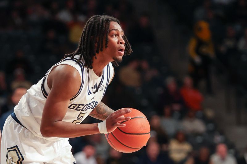 Jan 14, 2025; Atlanta, Georgia, USA; Georgia Tech Yellow Jackets guard Javian McCollum (2) looks for the pass against the Clemson Tigers during the first half at McCamish Pavilion. Mandatory Credit: Jordan Godfree-Imagn Images