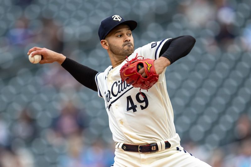 May 10, 2023; Minneapolis, Minnesota, USA; Minnesota Twins starting pitcher Pablo Lopez (49) delivers a pitch in the first inning against the San Diego Padres at Target Field. Mandatory Credit: Jesse Johnson-USA TODAY Sports