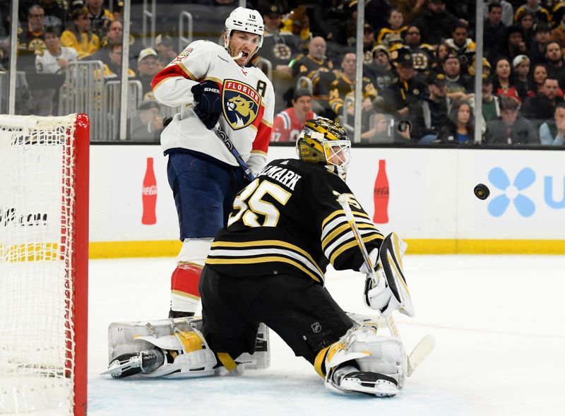 Apr 6, 2024; Boston, Massachusetts, USA; Boston Bruins goaltender Linus Ullmark (35) makes a save in front of Florida Panthers left wing Matthew Tkachuk (19) during the second period at TD Garden. Mandatory Credit: Bob DeChiara-USA TODAY Sports