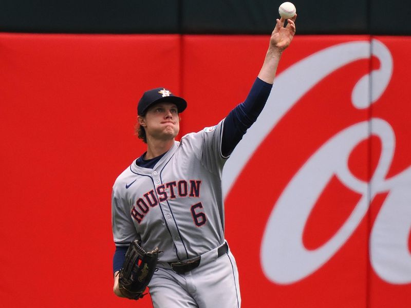 May 25, 2024; Oakland, California, USA; Houston Astros center fielder Jake Myers (6) throws the ball in field Oakland Athletics during the first inning at Oakland-Alameda County Coliseum. Mandatory Credit: Kelley L Cox-USA TODAY Sports