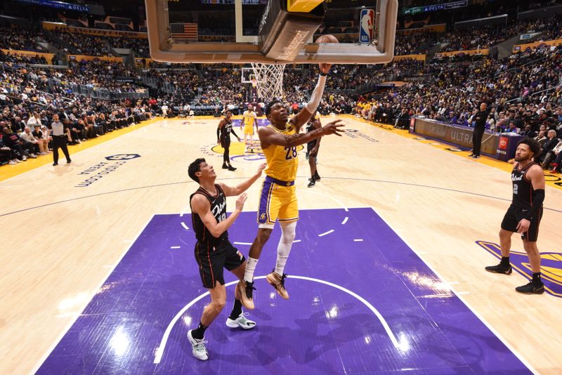 LOS ANGELES, CA - JANUARY 6: Rui Hachimura #28 of the Los Angeles Lakers drives to the basket during the game against the Detroit Pistons on January 6, 2024 at Crypto.Com Arena in Los Angeles, California. NOTE TO USER: User expressly acknowledges and agrees that, by downloading and/or using this Photograph, user is consenting to the terms and conditions of the Getty Images License Agreement. Mandatory Copyright Notice: Copyright 2024 NBAE (Photo by Adam Pantozzi/NBAE via Getty Images)