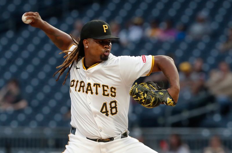 Sep 25, 2024; Pittsburgh, Pennsylvania, USA;  Pittsburgh Pirates starting pitcher Luis L. Ortiz (48) delivers a pitch against the Milwaukee Brewers during the first inning at PNC Park. Mandatory Credit: Charles LeClaire-Imagn Images