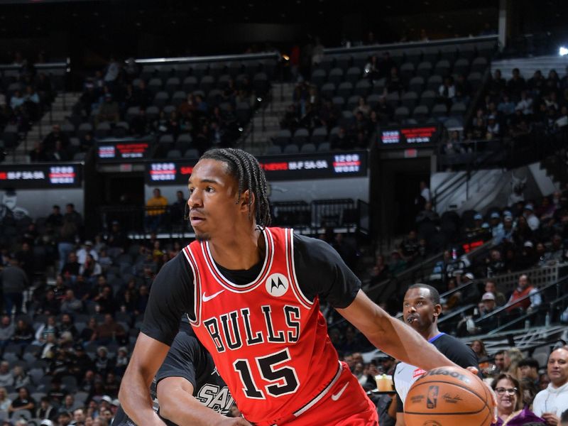 SAN ANTONIO, TX - DECEMBER 5: Julian Phillips #15 of the Chicago Bulls drives to the basket during the game against the San Antonio Spurs on December 5, 2024 at the Frost Bank Center in San Antonio, Texas. NOTE TO USER: User expressly acknowledges and agrees that, by downloading and or using this photograph, user is consenting to the terms and conditions of the Getty Images License Agreement. Mandatory Copyright Notice: Copyright 2024 NBAE (Photos by Michael Gonzales/NBAE via Getty Images)