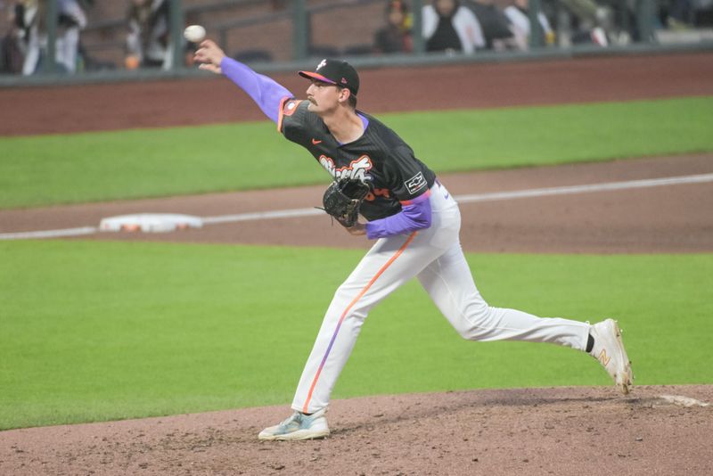 Jun 24, 2025; San Francisco, California, USA;  San Francisco Giants pitcher Sean Hjelle (64) throws a pitch against the Miami Marlins during the seventh inning at Oracle Park. Mandatory Credit: Ed Szczepanski-Imagn Images