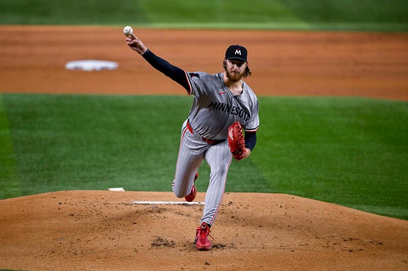 Aug 15, 2024; Arlington, Texas, USA; Minnesota Twins starting pitcher Bailey Ober (17) pitches against the Texas Rangers during the first inning at Globe Life Field. Mandatory Credit: Jerome Miron-USA TODAY Sports