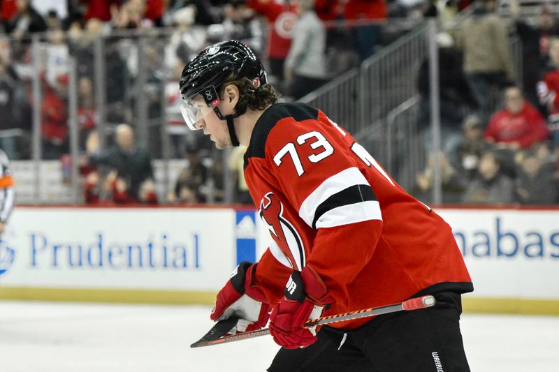 Feb 25, 2024; Newark, New Jersey, USA; New Jersey Devils right wing Tyler Toffoli (73) heads towards his bench after scoring a goal against the Tampa Bay Lightning during the second period at Prudential Center. Mandatory Credit: John Jones-USA TODAY Sports