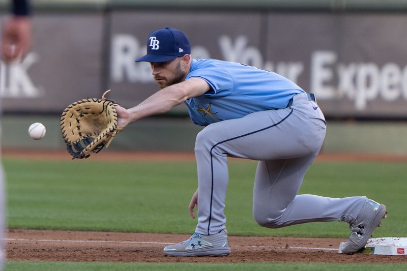 Aug 19, 2024; Oakland, California, USA; Tampa Bay Rays second base Brandon Lowe (8) catches the ball for an out during the first inning against the Oakland Athletics at Oakland-Alameda County Coliseum. Mandatory Credit: Stan Szeto-USA TODAY Sports