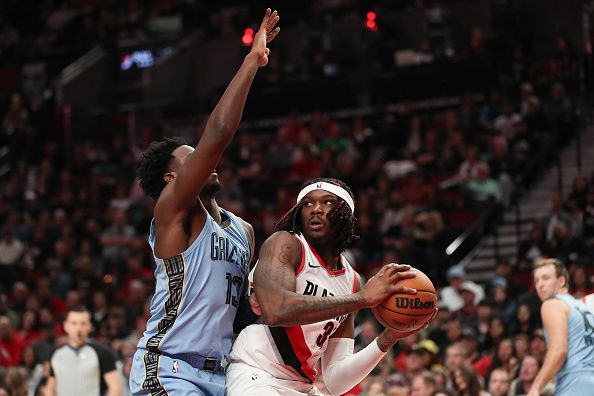 PORTLAND, OREGON - NOVEMBER 05: Jaren Jackson Jr. #13 of the Memphis Grizzlies defends against Robert Williams III #35 of the Portland Trail Blazers during the third quarter at Moda Center on November 05, 2023 in Portland, Oregon. NOTE TO USER: User expressly acknowledges and agrees that, by downloading and or using this photograph, User is consenting to the terms and conditions of the Getty Images License Agreement.? (Photo by Amanda Loman/Getty Images)