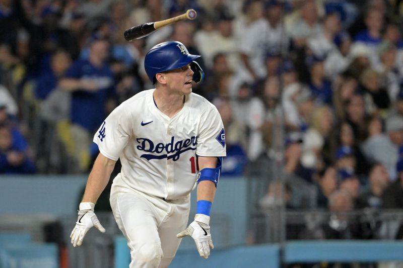 Sep 26, 2024; Los Angeles, California, USA;  Los Angeles Dodgers catcher Will Smith (16) celebrates after hitting a two-run home run off San Diego Padres starting pitcher Joe Musgrove (44) in the seventh inning at Dodger Stadium. Mandatory Credit: Jayne Kamin-Oncea-Imagn Images