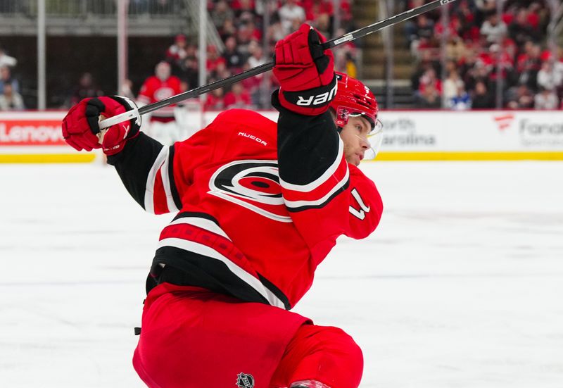 Apr 13, 2025; Raleigh, North Carolina, USA;  Carolina Hurricanes left wing Taylor Hall (71) shoots against the Toronto Maple Leafs during the third period at Lenovo Center. Mandatory Credit: James Guillory-Imagn Images