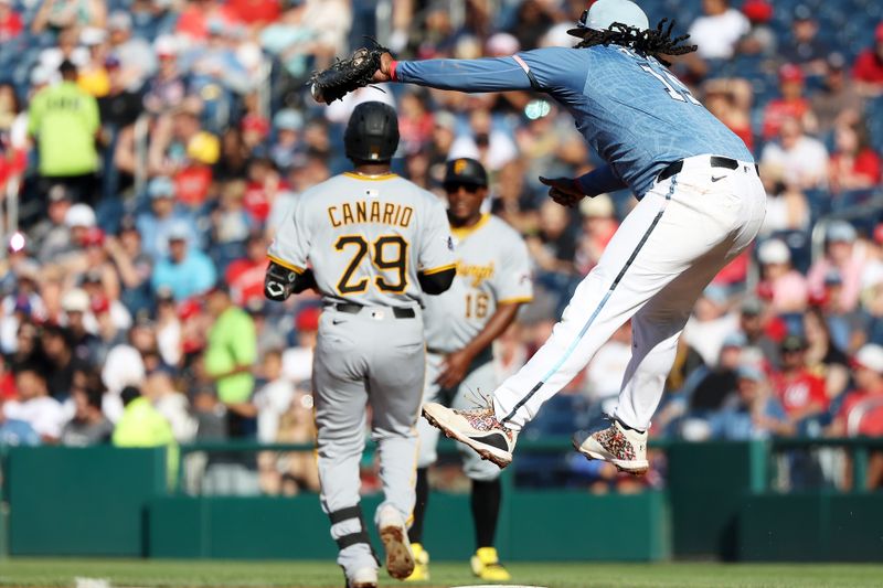 Sep 13, 2025; Washington, District of Columbia, USA; Washington Nationals first baseman Josh Bell (19) cannot tag Pittsburgh Pirates outfielder Alexander Canario (29) at first during the fourth inning at Nationals Park. Mandatory Credit: Daniel Kucin Jr.-Imagn Images