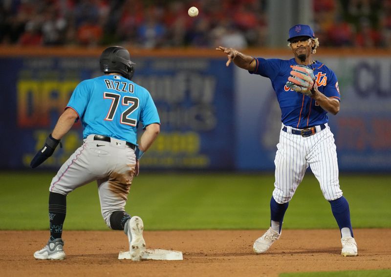 Feb 25, 2023; Port St. Lucie, Florida, USA;  New York Mets second baseman Chase Estep (12) gets the force out of Miami Marlins first baseman Joe Rizzo then throws to third base during the fourth inning at Clover Park. Mandatory Credit: Jim Rassol-USA TODAY Sports