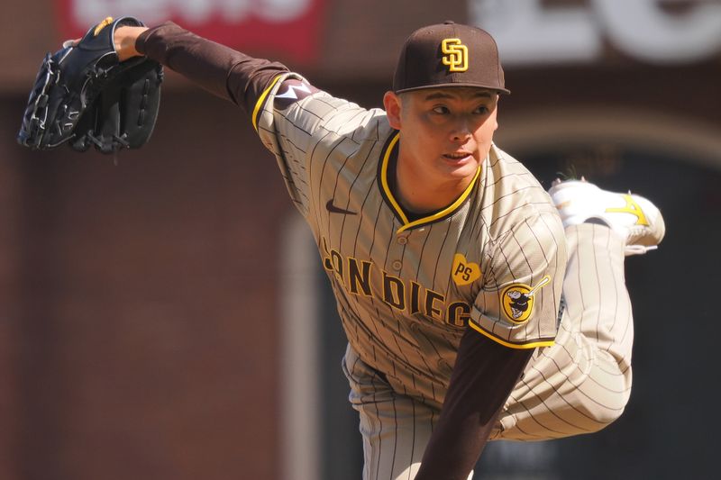 Apr 5, 2024; San Francisco, California, USA; San Diego Padres relief pitcher Yuki Matsui (1) pitches the ball against the San Francisco Giants during the seventh inning at Oracle Park. Mandatory Credit: Kelley L Cox-USA TODAY Sports