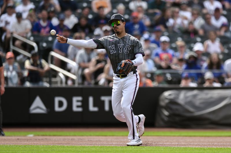 Jun 29, 2024; New York City, New York, USA; New York Mets third baseman Mark Vientos (27) throws to first base for an out against the Houston Astros during the first inning at Citi Field. Mandatory Credit: John Jones-USA TODAY Sports