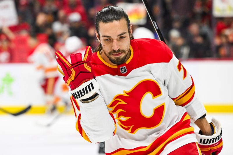 Nov 25, 2024; Ottawa, Ontario, CAN; Calgary Flames left wing Ryan Lomberg (70) looks on during warm-up before the game against the Ottawa Senators at Canadian Tire Centre. Mandatory Credit: David Kirouac-Imagn Images