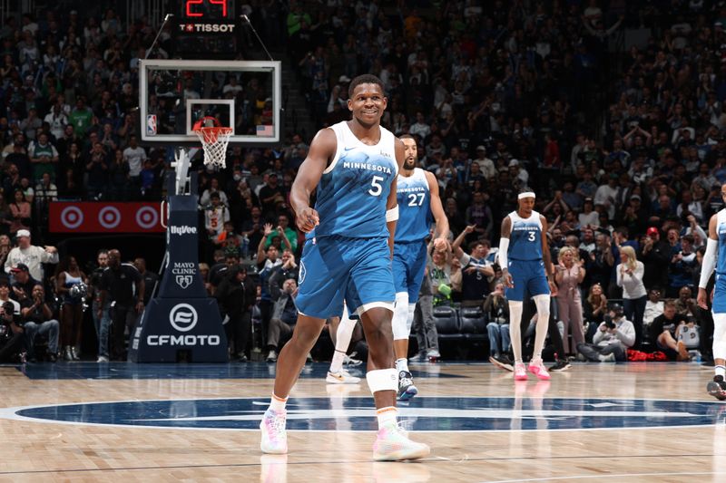 MINNEAPOLIS, MN -  APRIL 12: Anthony Edwards #5 of the Minnesota Timberwolves smiles during the game against the Atlanta Hawks on April 12, 2024 at Target Center in Minneapolis, Minnesota. NOTE TO USER: User expressly acknowledges and agrees that, by downloading and or using this Photograph, user is consenting to the terms and conditions of the Getty Images License Agreement. Mandatory Copyright Notice: Copyright 2024 NBAE (Photo by David Sherman/NBAE via Getty Images)