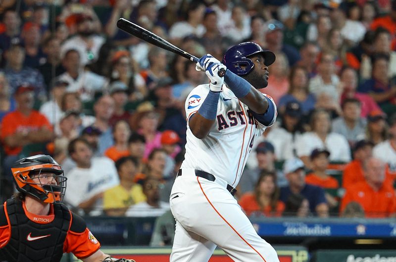 Jun 22, 2024; Houston, Texas, USA; Houston Astros designated hitter Yordan Alvarez (44) hits a home run during the third inning against the Baltimore Orioles at Minute Maid Park. Mandatory Credit: Troy Taormina-USA TODAY Sports