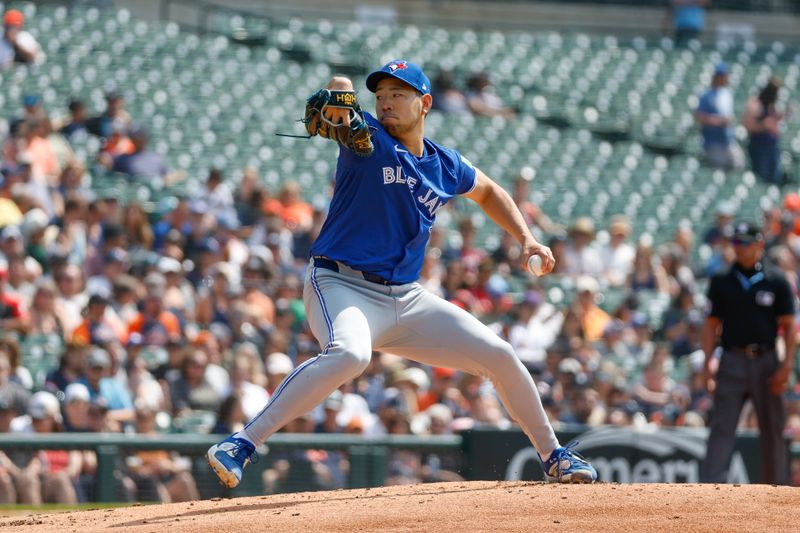 May 26, 2024; Detroit, Michigan, USA; Toronto Blue Jays starting pitcher Yusei Kikuchi (16) pitches during the first inning of the game against the Detroit Tigers at Comerica Park. Mandatory Credit: Brian Bradshaw Sevald-USA TODAY Sports