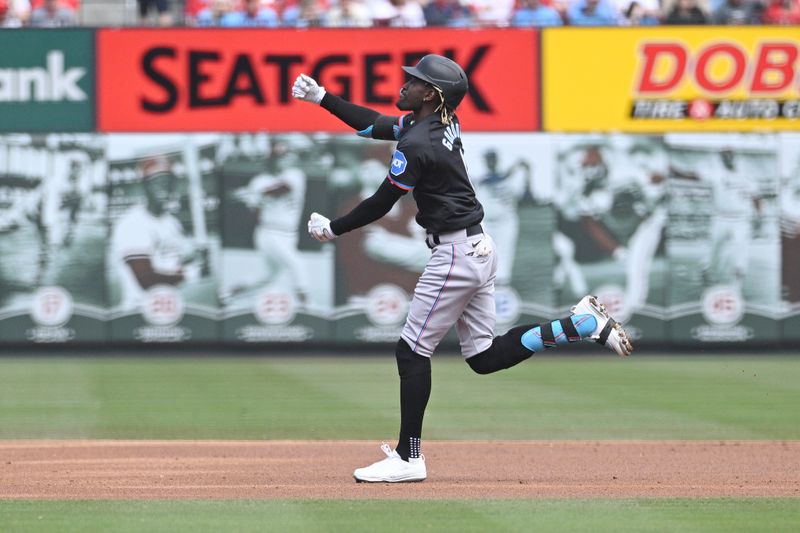 Apr 7, 2024; St. Louis, Missouri, USA; Miami Marlins outfielder Nick Gordon (1) reacts after hitting a three run home run against the St. Louis Cardinals during the first inning at Busch Stadium. Mandatory Credit: Jeff Le-USA TODAY Sports