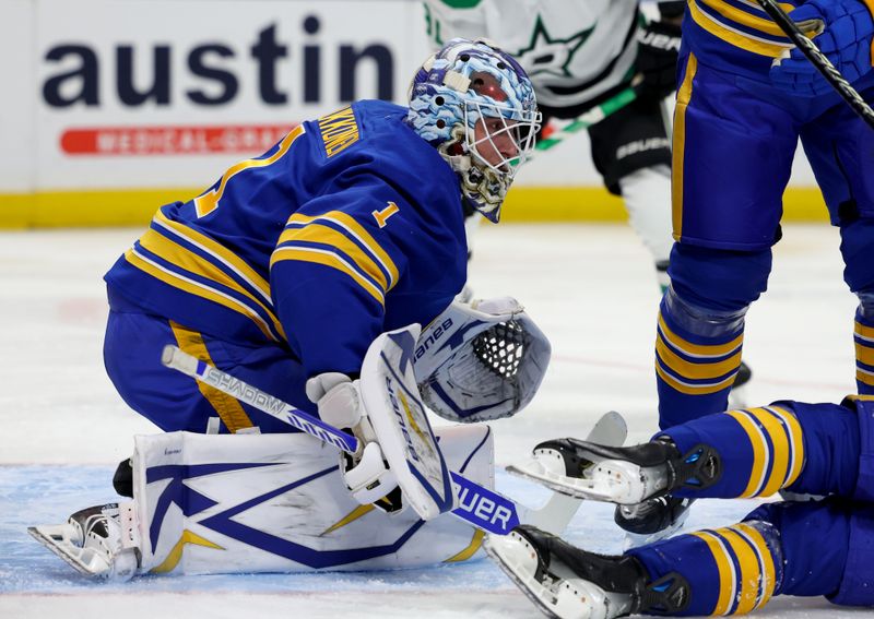 Oct 22, 2024; Buffalo, New York, USA;  Buffalo Sabres goaltender Ukko-Pekka Luukkonen (1) looks for the puck during the first period against the Dallas Stars at KeyBank Center. Mandatory Credit: Timothy T. Ludwig-Imagn Images