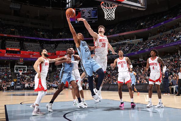 MEMPHIS, TN - DECEMBER 15:  Desmond Bane #22 of the Memphis Grizzlies drives to the basket during the game against the Houston Rockets on December 15, 2023 at FedExForum in Memphis, Tennessee. NOTE TO USER: User expressly acknowledges and agrees that, by downloading and or using this photograph, User is consenting to the terms and conditions of the Getty Images License Agreement. Mandatory Copyright Notice: Copyright 2023 NBAE (Photo by Joe Murphy/NBAE via Getty Images)