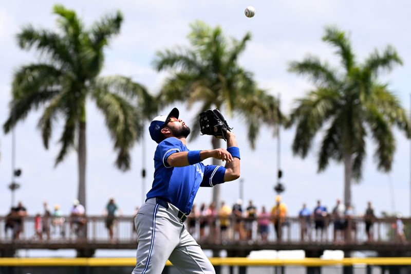 Mar 25, 2024; Bradenton, Florida, USA; Toronto Blue Jays third baseman Isiah Kiner-Falefa (7) catches a fly ball in the second inning of the spring training game against the Pittsburgh Pirates at LECOM Park. Mandatory Credit: Jonathan Dyer-USA TODAY Sports