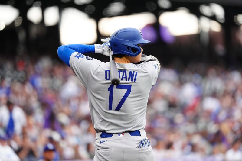 Jun 24, 2025; Denver, Colorado, USA; Los Angeles Dodgers designated hitter Shohei Ohtani (17) warms up during the first inning against the Colorado Rockies at Coors Field. Mandatory Credit: Ron Chenoy-Imagn Images