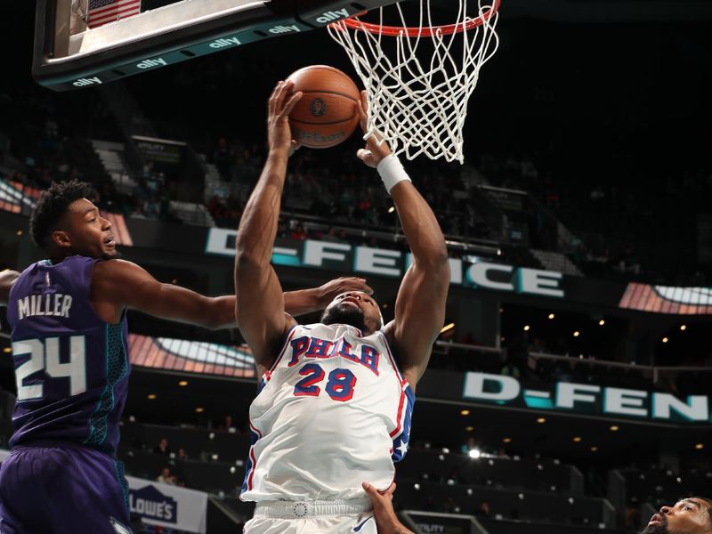 CHARLOTTE, NC - DECEMBER 3: Guerschon Yabusele #28 of the Philadelphia 76ers drives to the basket during the game against the Charlotte Hornets during an NBA Emirates Cup game on December 3, 2024 at Spectrum Center in Charlotte, North Carolina. NOTE TO USER: User expressly acknowledges and agrees that, by downloading and or using this photograph, User is consenting to the terms and conditions of the Getty Images License Agreement. Mandatory Copyright Notice: Copyright 2024 NBAE (Photo by Kent Smith/NBAE via Getty Images)