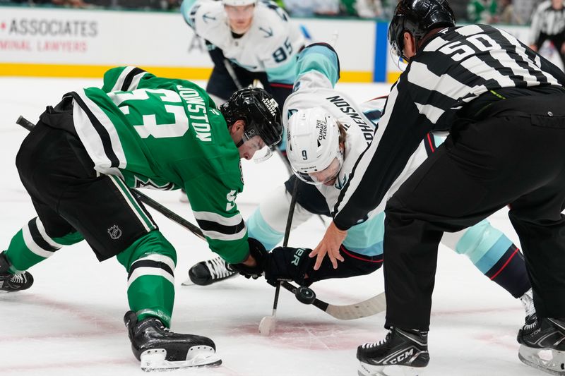 Oct 13, 2024; Dallas, Texas, USA;  Dallas Stars center Wyatt Johnston (53) gets set during a face-off against Seattle Kraken center Chandler Stephenson (9) during the first period at American Airlines Center. Mandatory Credit: Chris Jones-Imagn Images