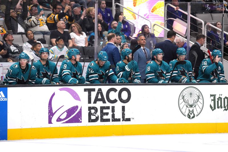 Nov 4, 2023; San Jose, California, USA; San Jose Sharks players sit on the bench during the third period against the Pittsburgh Penguins at SAP Center at San Jose. Mandatory Credit: Darren Yamashita-USA TODAY Sports