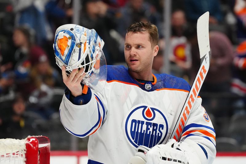 Apr 18, 2024; Denver, Colorado, USA; Edmonton Oilers goaltender Calvin Pickard (30) during the second period against the Colorado Avalanche at Ball Arena. Mandatory Credit: Ron Chenoy-USA TODAY Sports
