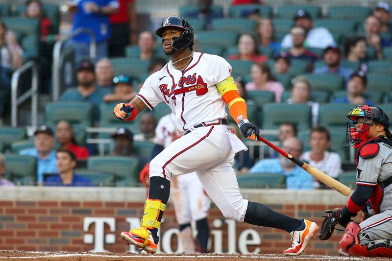 Jun 27, 2023; Atlanta, Georgia, USA; Atlanta Braves right fielder Ronald Acuna Jr. (13) hits a home run against the Minnesota Twins in the second inning at Truist Park. Mandatory Credit: Brett Davis-USA TODAY Sports
