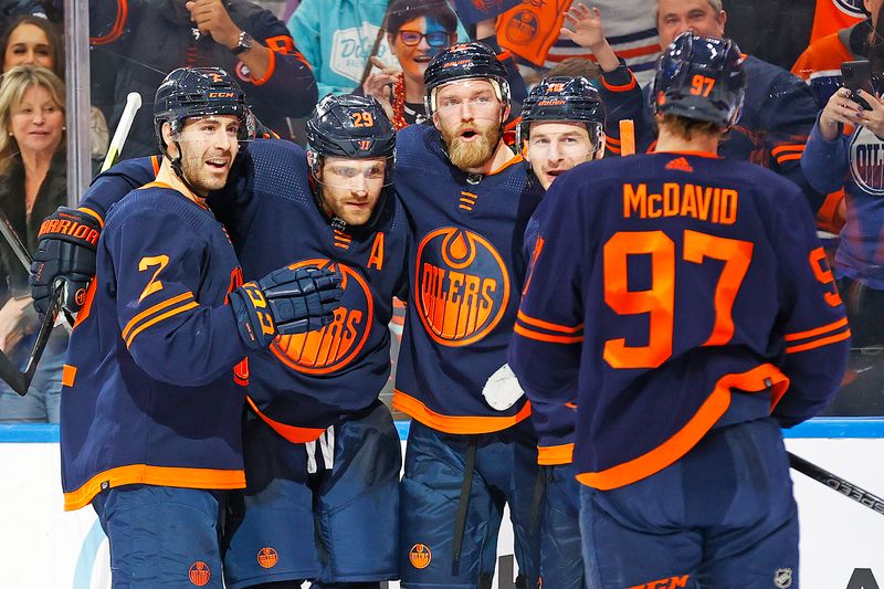 Mar 21, 2024; Edmonton, Alberta, CAN; The Edmonton Oilers celebrate a goal scored by defensemen Mattias Ekholm (14) during the third period against the Buffalo Sabres at Rogers Place. Mandatory Credit: Perry Nelson-USA TODAY Sports