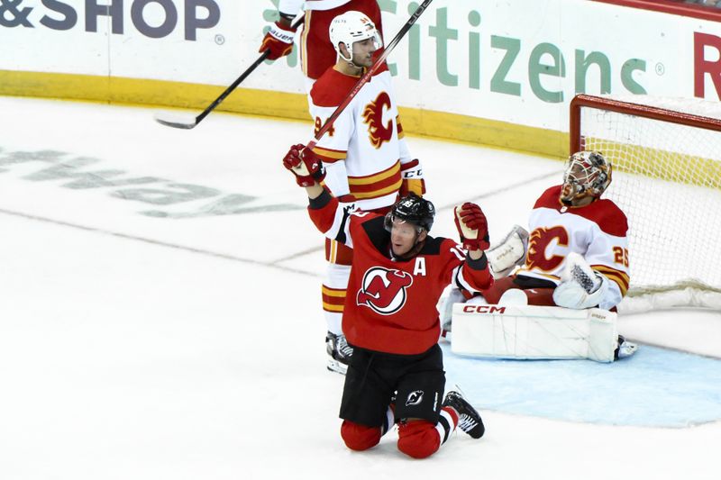 Feb 8, 2024; Newark, New Jersey, USA; New Jersey Devils left wing Ondrej Palat (18) reacts after scoring a goal against the Calgary Flames during the third period at Prudential Center. Mandatory Credit: John Jones-USA TODAY Sports